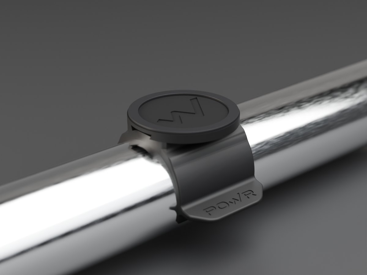 WizeLift Bar Clip on a barbell sleeve: clip, MagSafe plate and magnet ring